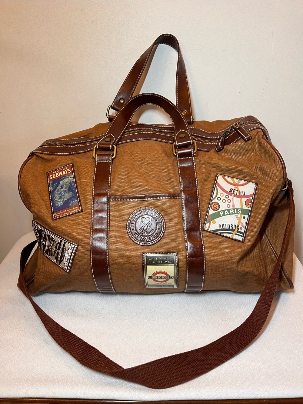 Sydney Love Brown Canvas Duffel with Leather Trim and Travel Patch Accents